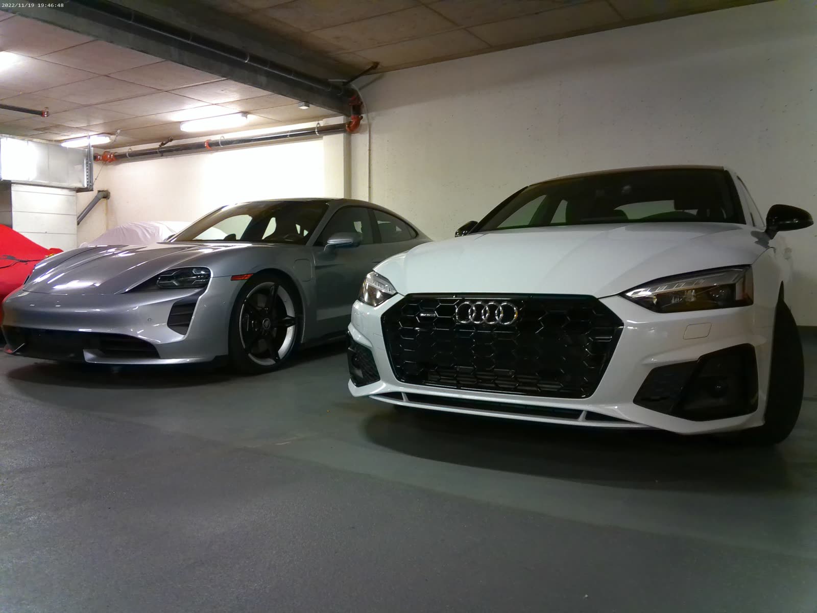Two cars Audi and porshe cleaned and polished outside