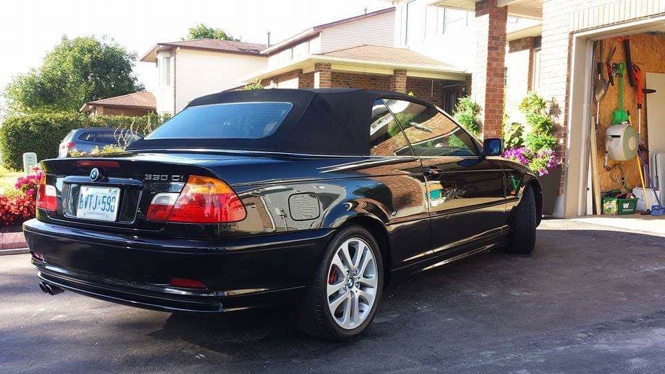 scratch removal from black BMW with nice background