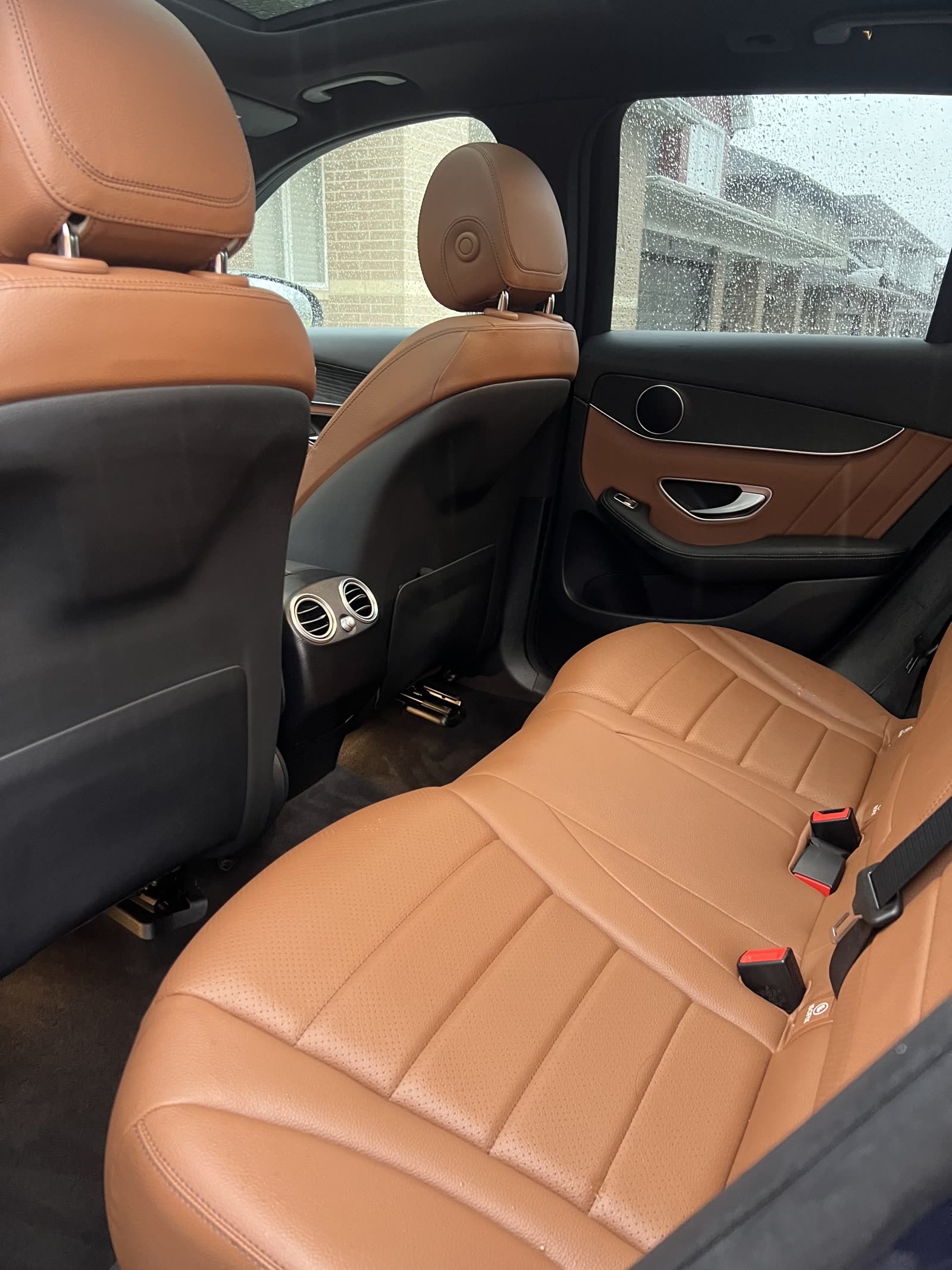 Cleaning and conditioning leather seats in a car